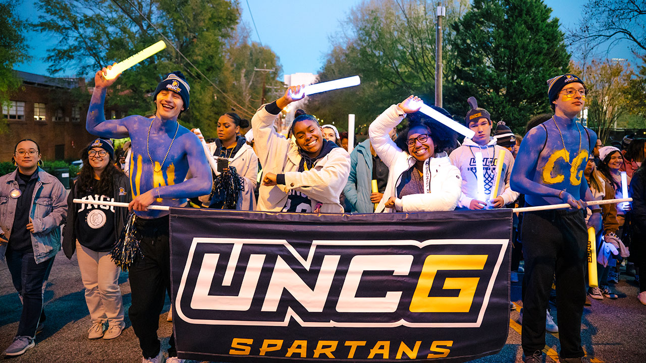 Students of UNCG march from the baseball stadium all the way to the Greensboro Coliseum with the drumlins leading the walk of school spirit. This march lead to a basketball game in the Coliseum