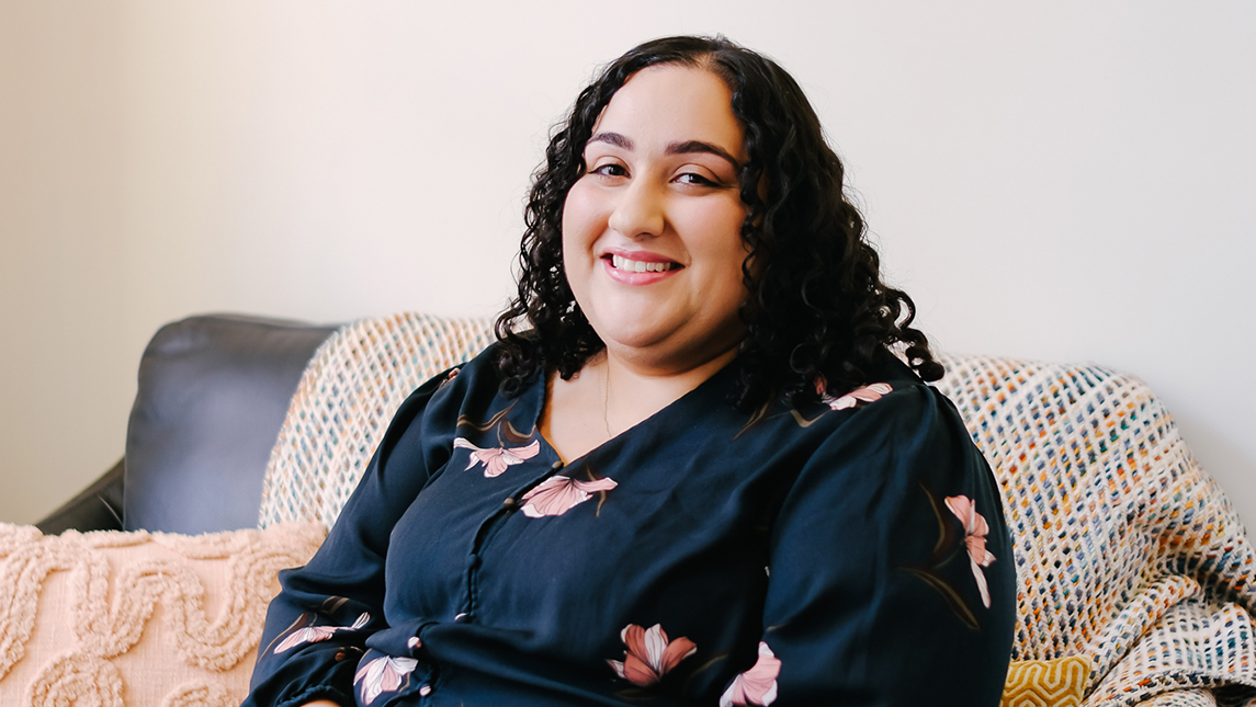 alumna and registered dietitian nutritionist Kimmie Singh sits in her office